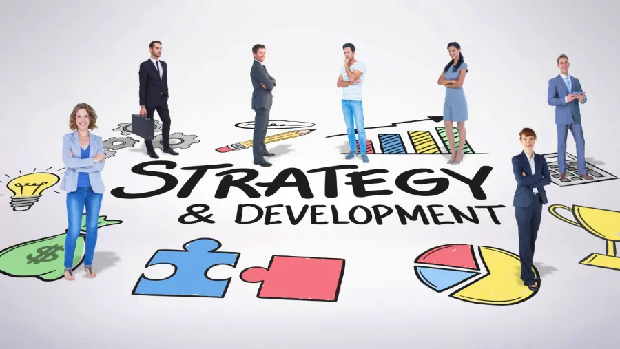 Seven business professionals stand around large text that reads “Strategy & Development,” with colorful icons like a puzzle piece and trophy, highlighting key elements of boosting SEO performance and improving search rankings for effective growth.